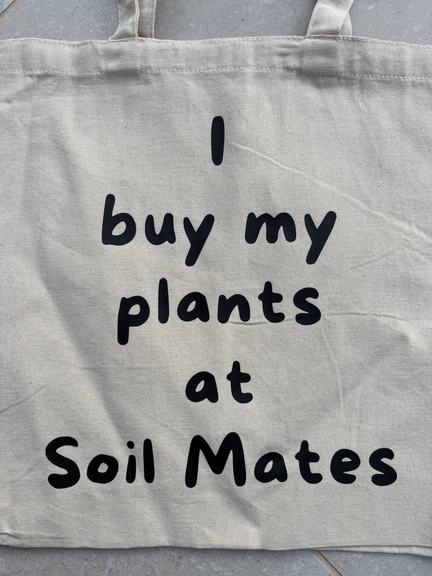 I buy my plants at Soil Mates - cream with black cotton tote bag
